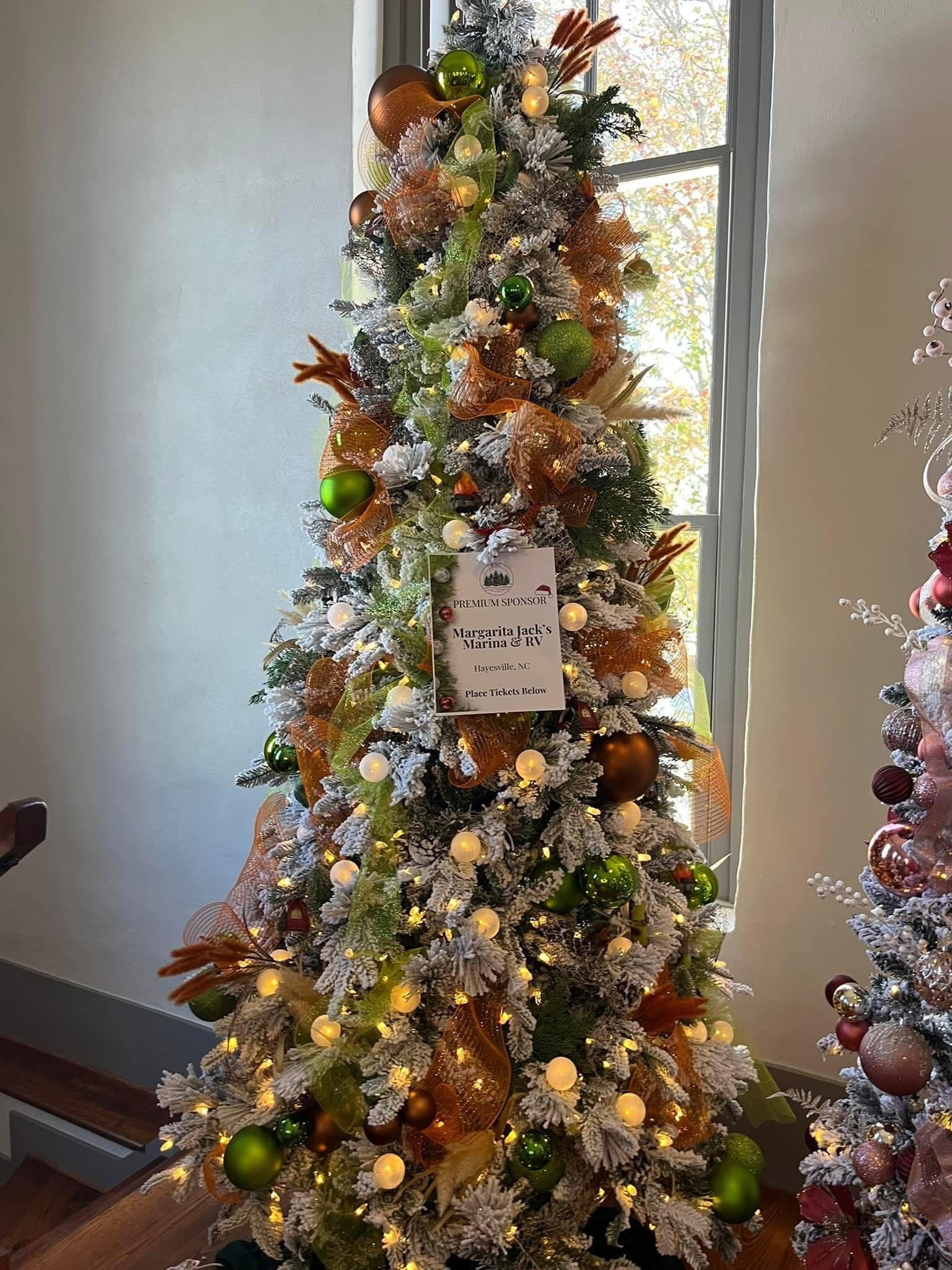 Warm copper and green bring a playful holiday glow at the WNC Festival of Trees in Hayesville, North Carolina