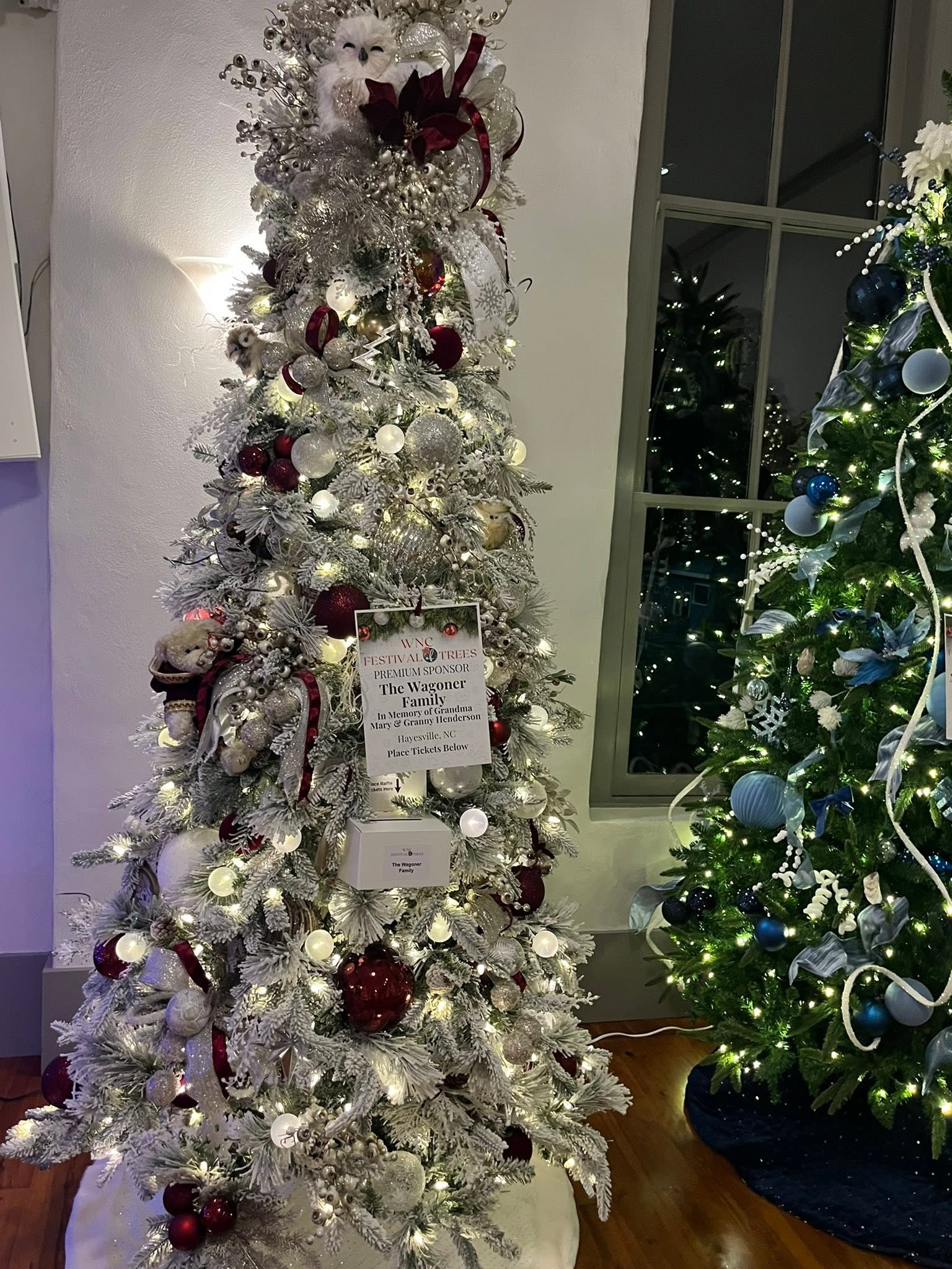 Elegant burgundy and silver memorial tree at the WNC Festival of Trees in Hayesville, North Carolina